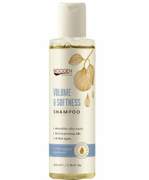 Wooden Spoon Volume and Softness Shampoo bottle with label, showcasing natural ingredients and a sleek design.