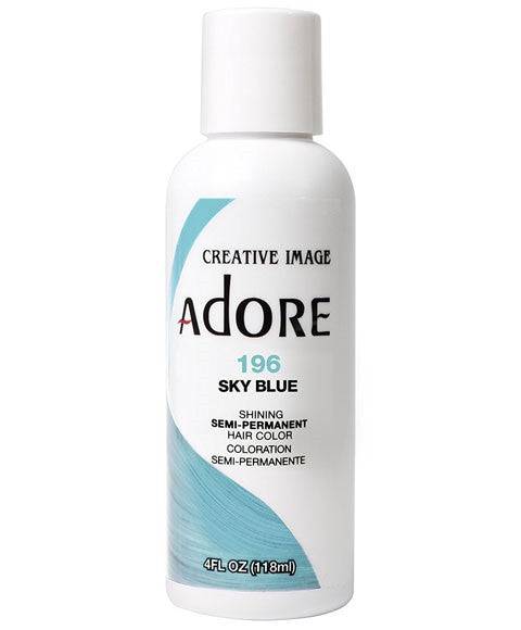 Creative Image Adore Shining Sky Blue semi-permanent hair color applied to hair, vibrant blue shade for bold hair styling.