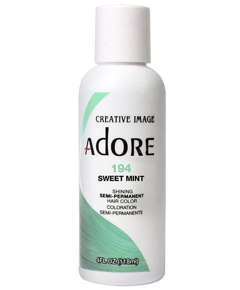 Creative Image Adore Shining Semi Permanent Hair Color in Sweet Mint, vibrant green hair dye applied to hair for bold color.
