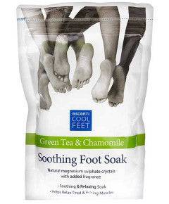Escenti Cool Feet green tea and chamomile soothing foot soak in a clear jar, showing the herbal ingredients and calming formula.
