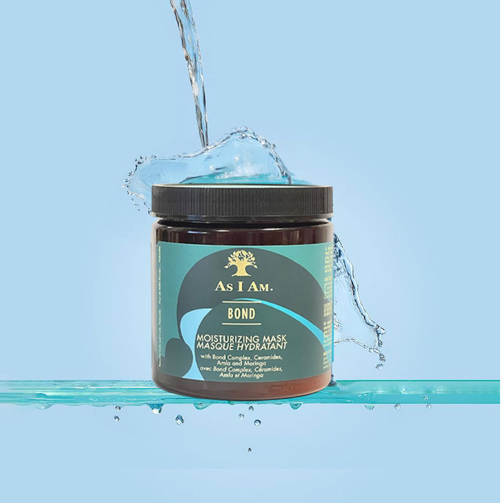 Cream-colored jar of As I Am Bond Moisturizing Hair Mask for deep conditioning, with the product label visible.