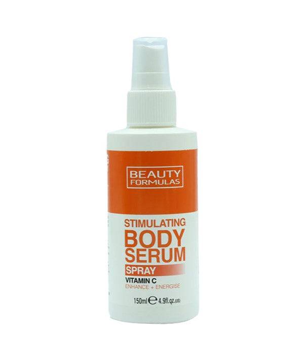 Beauty Formulas stimulating body serum spray with vitamin C, featuring a clear spray bottle and bright packaging for skin revitalization.