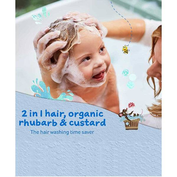 Childs Farm 2-in-1 kids hair and body wash with organic rhubarb and custard scent, showing the bottle with colorful label