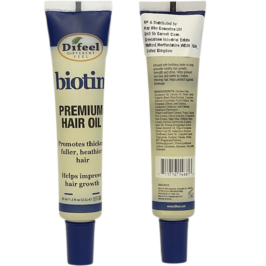 Difeel Biotin Premium Hair Oil treatment in a tube, showing the product packaging and applicator for nourishing hair care.