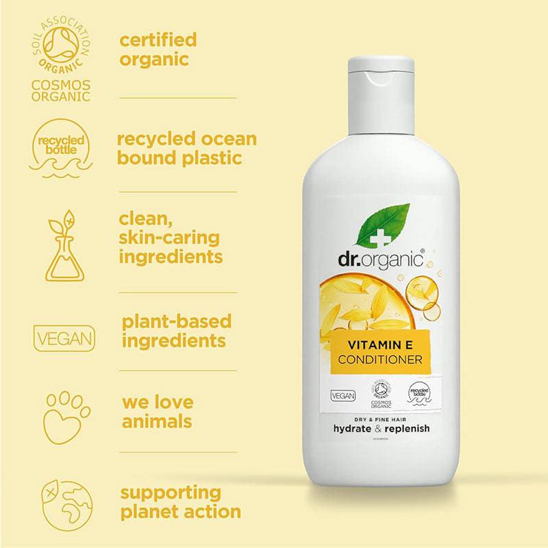 Dr Organic Hydrate and Replenish Vitamin E conditioner bottle with pump dispenser, labeled as organic hair care product.