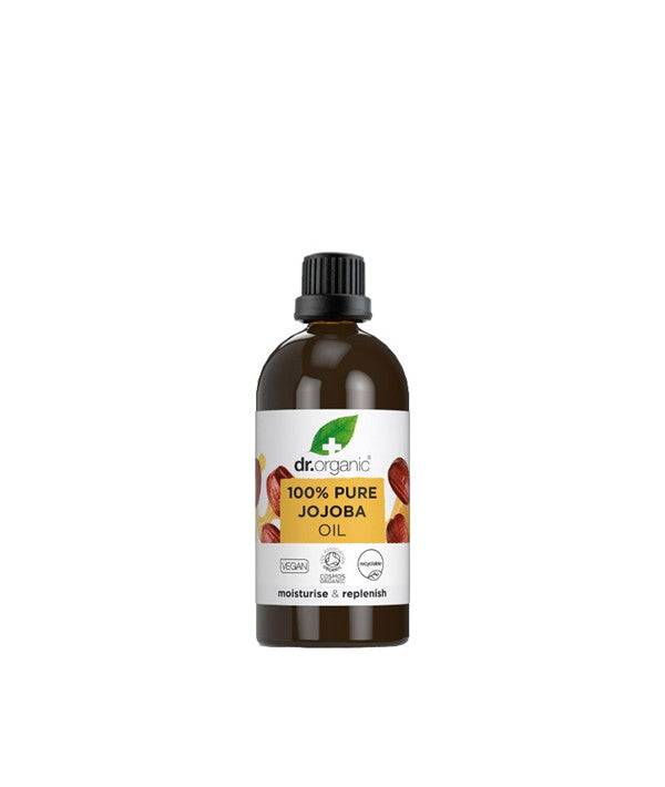 Dr Organic body care bottle of Moisturise and Replenish Pure Jojoba Oil, with a clear label and pump dispenser.