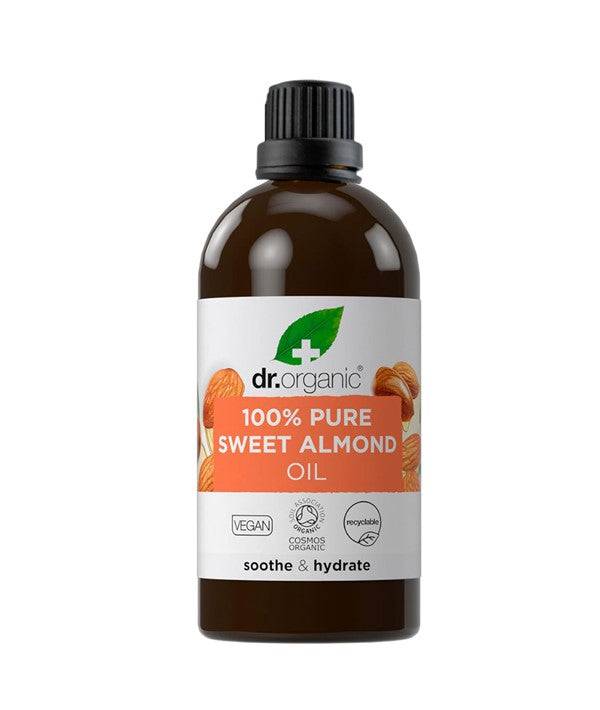 Dr Organic Soothe and Hydrate Pure Sweet Almond Oil hair treatment bottle with a white label and gold cap.