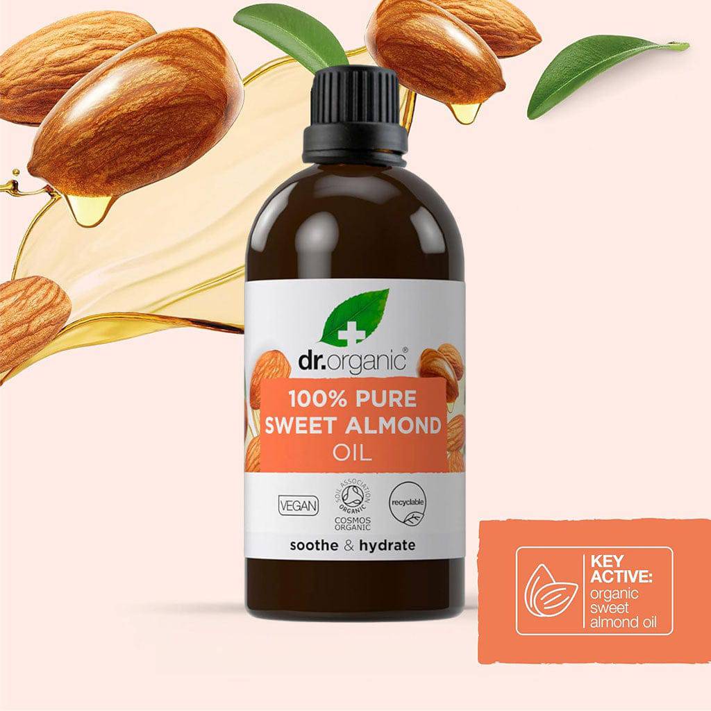Dr Organic Soothe and Hydrate pure sweet almond oil hair treatment bottle with dropper showing on white background.