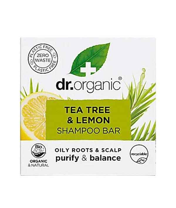 Dr Organic tea tree and lemon shampoo bar with natural ingredients, shown in a clear, close-up image.