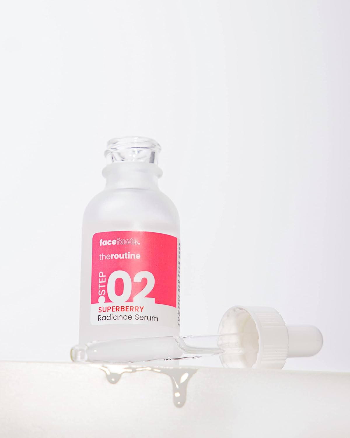 Face Facts Superberry Radiance Serum bottle, a 30ml moisturizer with a vibrant, berry-inspired design for glowing skin.