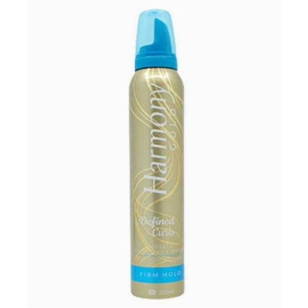 Three Pears Harmony Gold Defined Curls Firm Hold Mousse bottle with gold accents, designed for styling and defining curly hair.