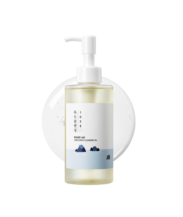 Round Lab 1025 Dokdo Cleansing Oil in a clear bottle with a pump dispenser, designed for gentle K-beauty skincare.