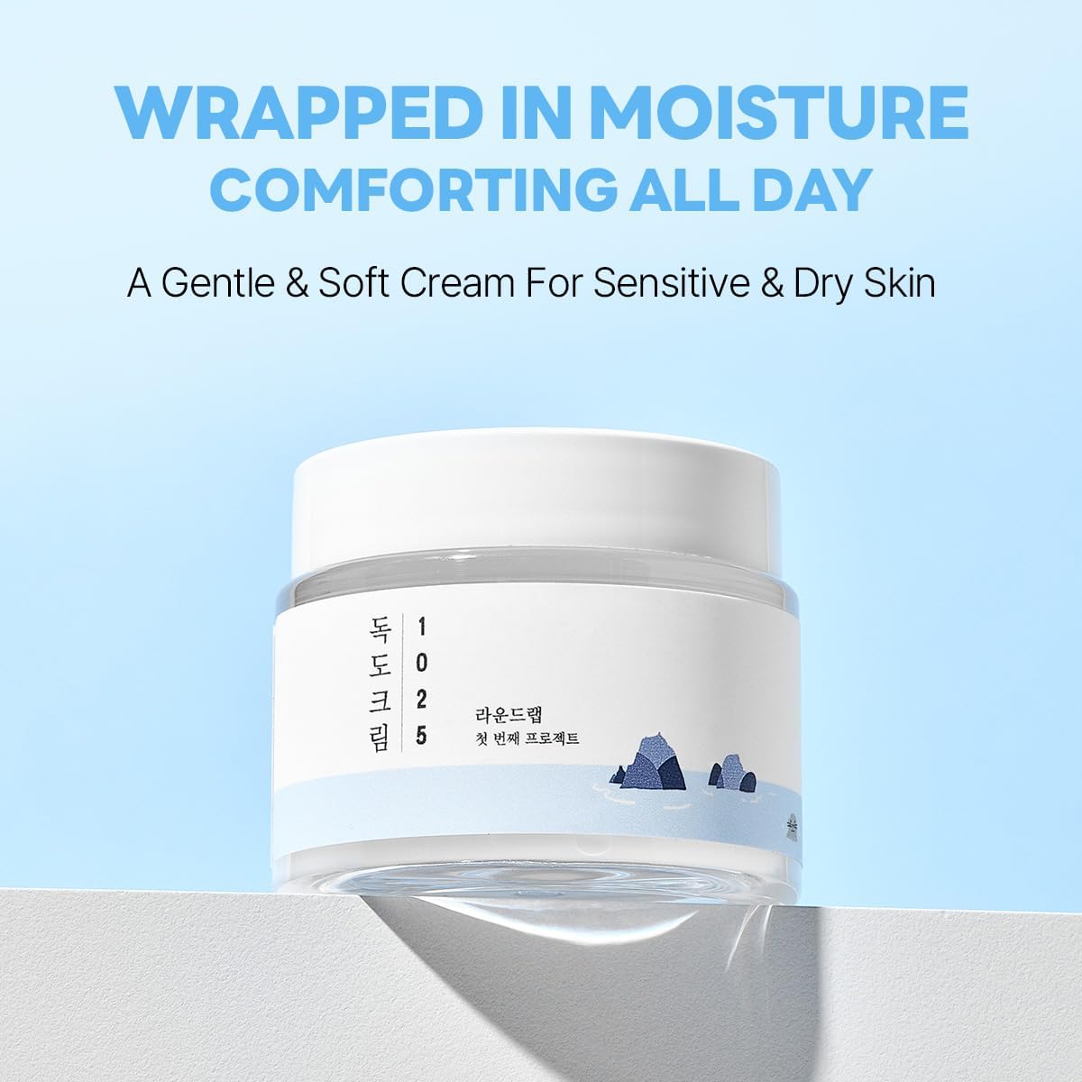 Round Lab 1025 Dokdo Cream, a K-beauty moisturizer in an 80ml jar, featuring a smooth, creamy texture for hydrating skin.
