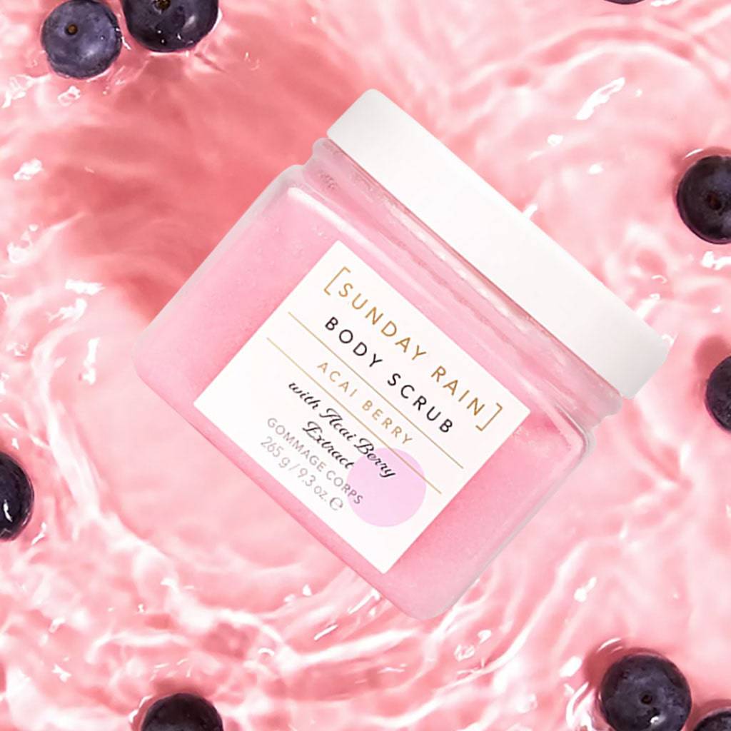 Sunday Rain Acai Berry Body Scrub for bath and shower, with a jar of exfoliating scrub featuring acai berry extract.
