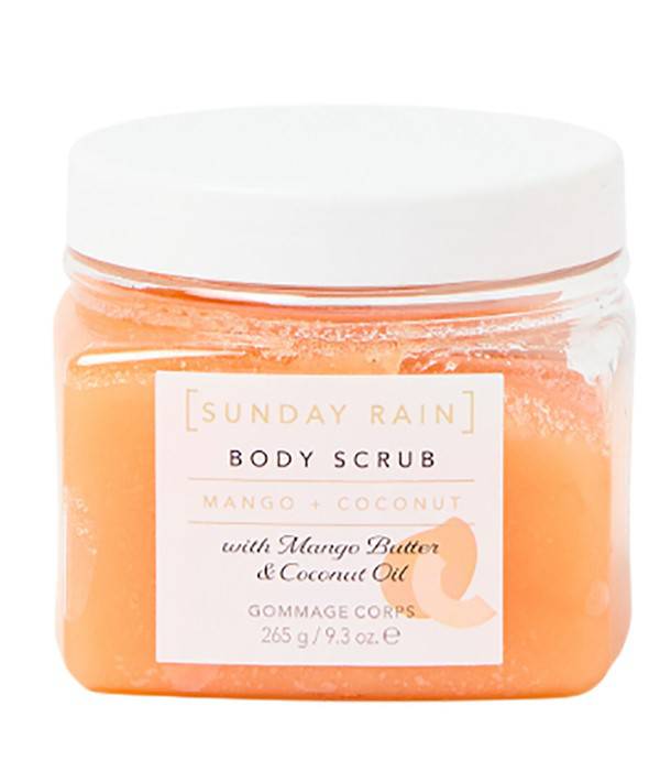Sunday Rain mango and coconut body scrub in a jar, perfect for bath and shower skincare with tropical scent and exfoliating texture.