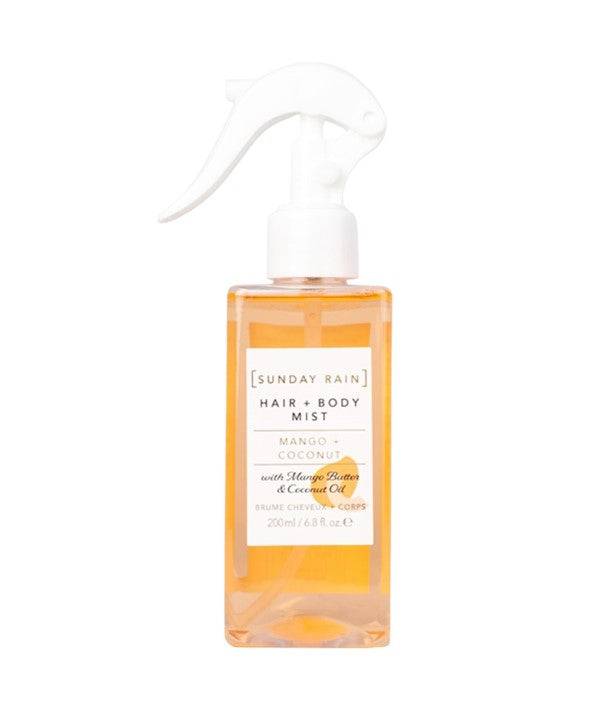 Sunday Rain Mango Coconut Hair and Body Mist bottle with tropical scent, featuring a clear spray nozzle and colorful label.