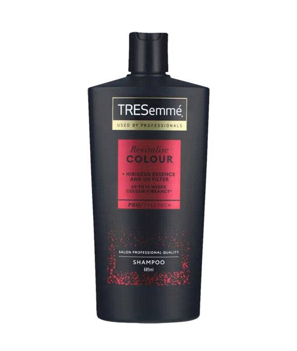 TRESemme Revitalise Colour Hibiscus Essence and UV Filter Shampoo bottle with vibrant hibiscus flower design.