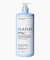Olaplex No.4C Bond Maintenance Clarifying Shampoo bottle with label, used for deep cleansing and bond repair in hair care.