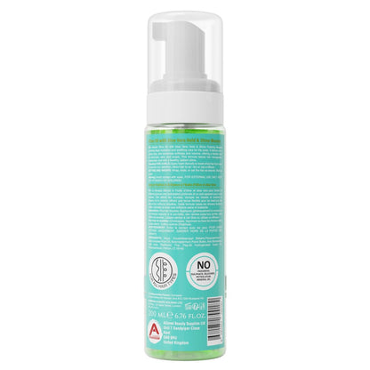 Allored Beauty olive oil and aloe vera foaming mousse for hold and shine, styled in a hair product bottle with a pump dispenser.