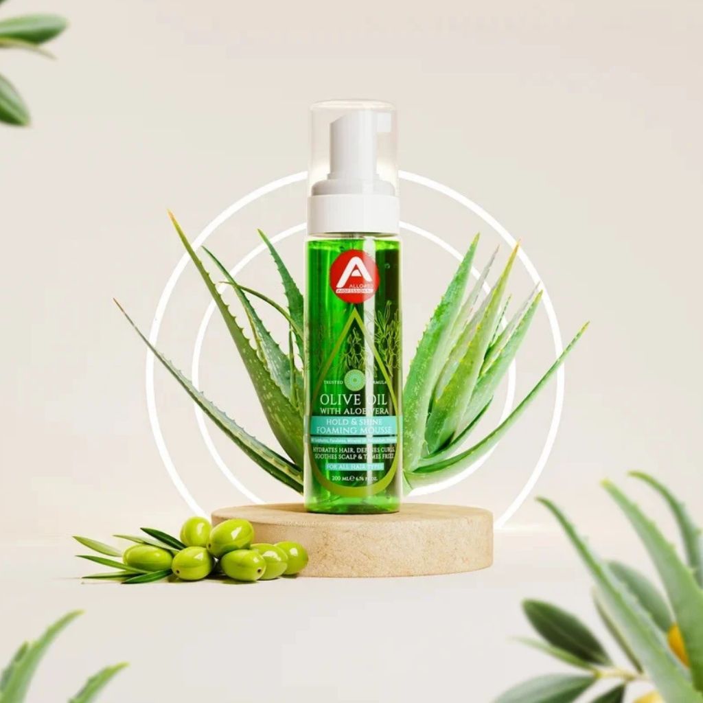 Allored Beauty Olive Oil with Aloe Vera hold and shine foaming mousse for hair styling, showing the product bottle.