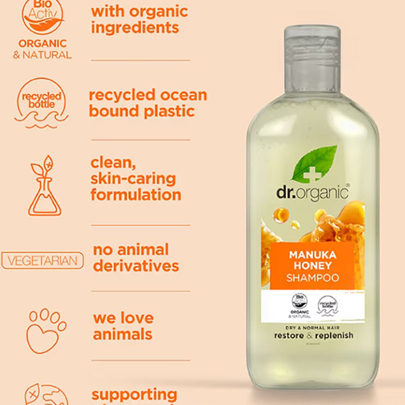 Dr Organic Restore and Replenish Manuka Honey shampoo bottle with a gold cap and label, designed for hair nourishment and repair.