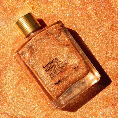 Face Facts 3-in-1 shimmer glow oil for body care, featuring a shiny, luminous finish in a sleek bottle.