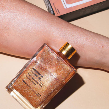 Face Facts 3-in-1 shimmer glow oil for body care, featuring a sparkling, luminous finish on the skin.