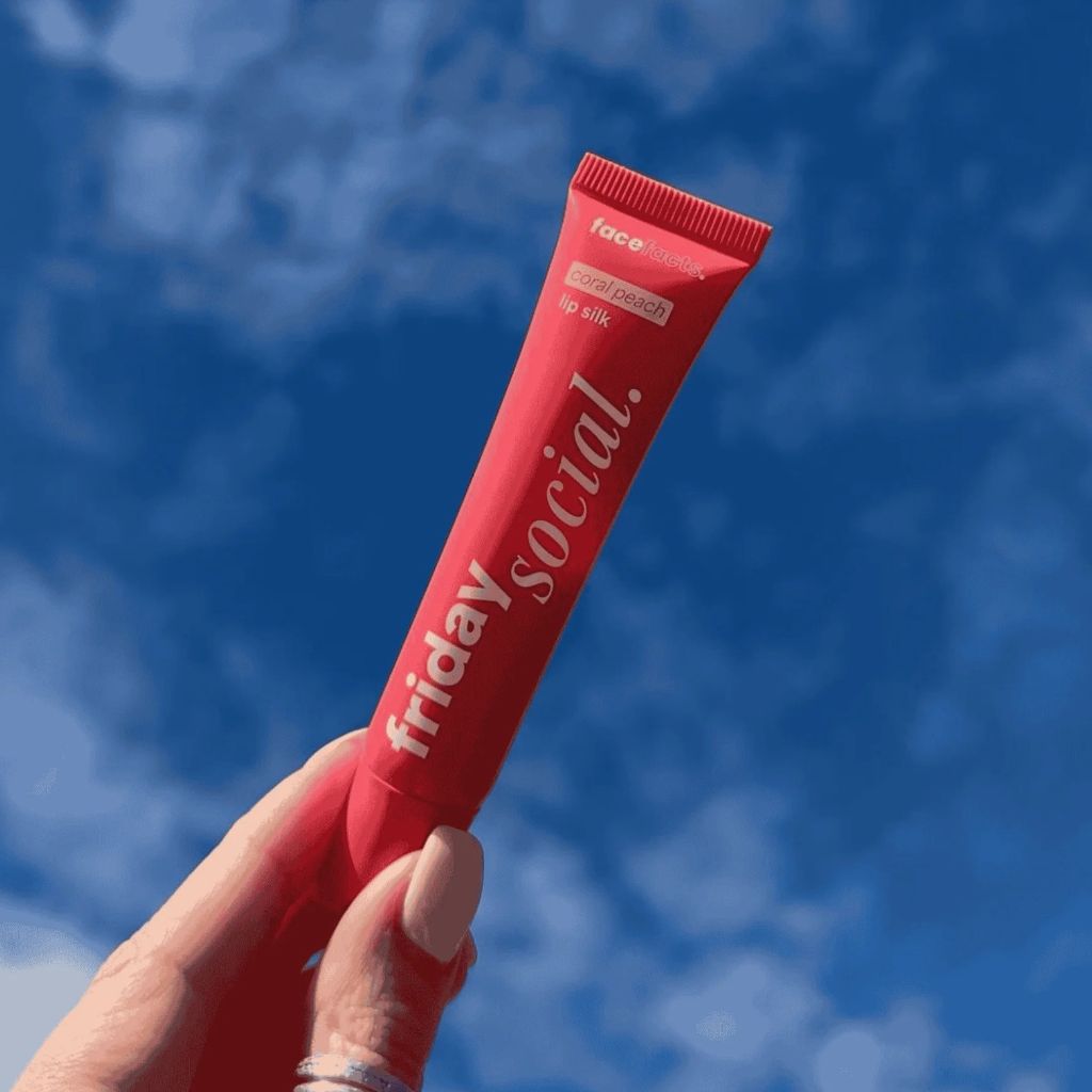 Face Facts Friday Social Lip Silk in Coral Peach lip care balm tube