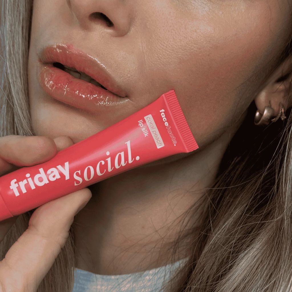 Face Facts Friday Social Lip Silk in Coral Peach lip care product tube
