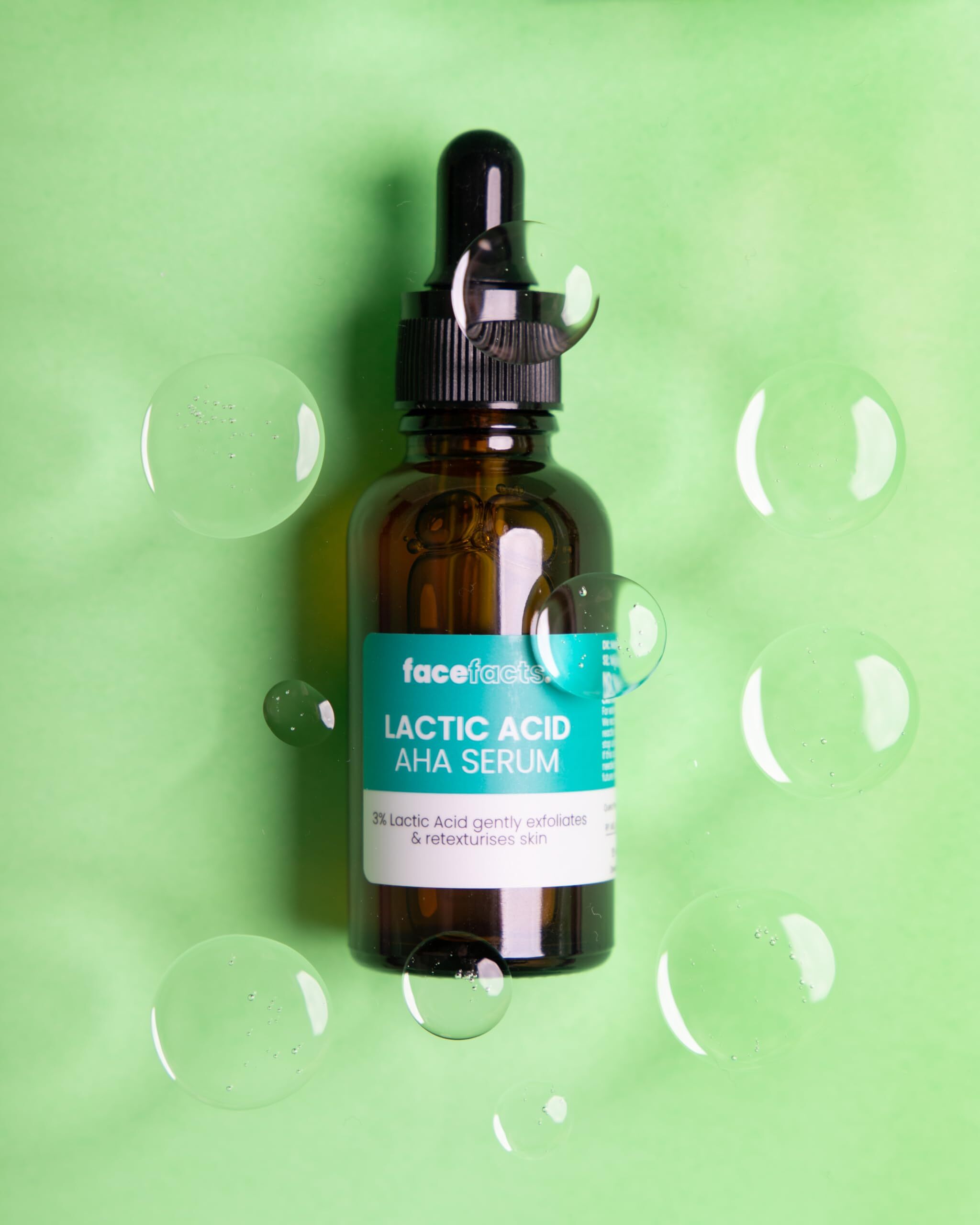 Face Facts Glow Plus Resurface Lactic Acid AHA Serum moisturizer in a clear bottle with pump dispenser.