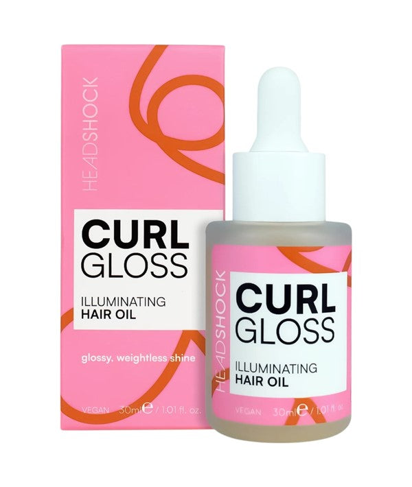 Face Facts Headshock Curl Gloss illuminating hair oil in a clear bottle, showcasing shiny, healthy curls and hair treatment benefits.