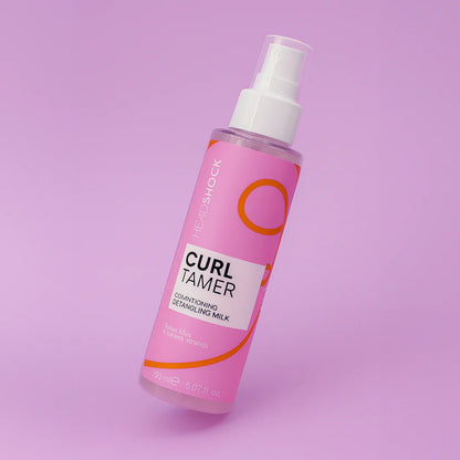Face Facts Face Facts Headshock Curl Tamer Conditioner bottle with curl taming and detangling features for curly hair.