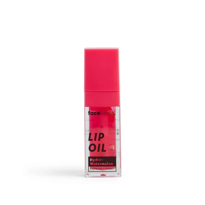 Face Facts Nourish Plus Renew Hydro Watermelon Pink Blush Lip Oil in a clear tube with pink-tinted oil and watermelon scent.