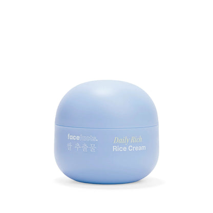 Face Facts Rice Extract Daily Rich Rice Cream moisturizer in a jar, showing its smooth, creamy texture and packaging.