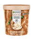 Garnier Good Permanent Hair Colour 8.34 Spiced Cinnamon Blonde, showcasing the vibrant reddish-brown hair shade.