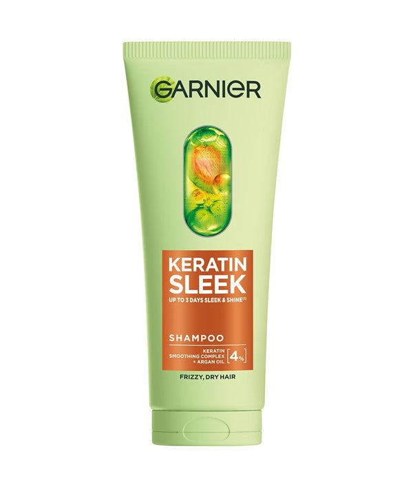 Garnier Keratin Sleek Shampoo bottle, 200ml, with sleek hair illustration, for smooth, shiny hair care.