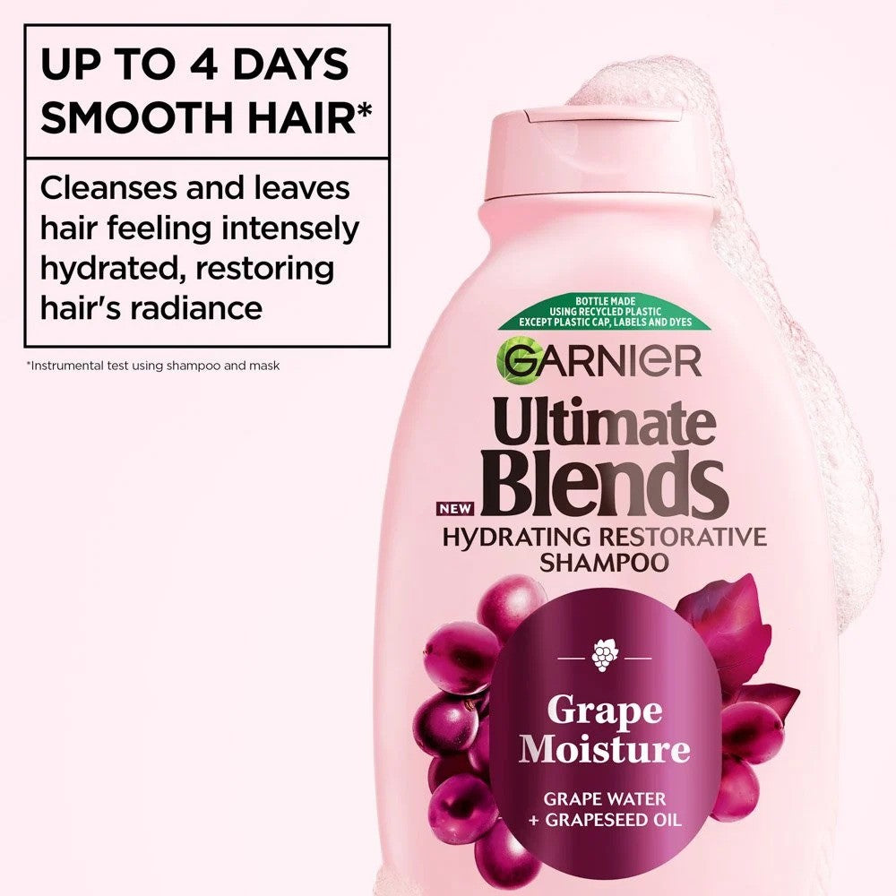 Garnier Ultimate Blends Grape Moisture Hydrating Restorative Shampoo bottle, 300ml, with purple grape and floral imagery.