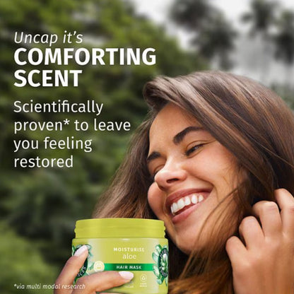 Herbal Essences Moisture Aloe Hair Mask in a jar, designed for nourishing and hydrating hair treatment with aloe vera.