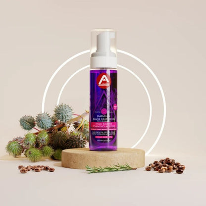 Allored Beauty Jamaican Black Castor Oil with Rosemary hold and shine foaming mousse for hair styling, showing the product in a pump bottle.