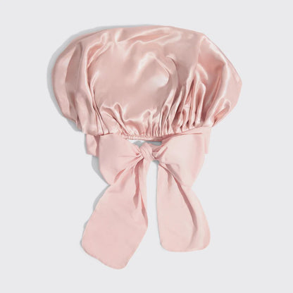 Kitsch oversized adjustable satin hair bonnet with soft, smooth fabric and elastic edge for comfortable fit and hair protection.