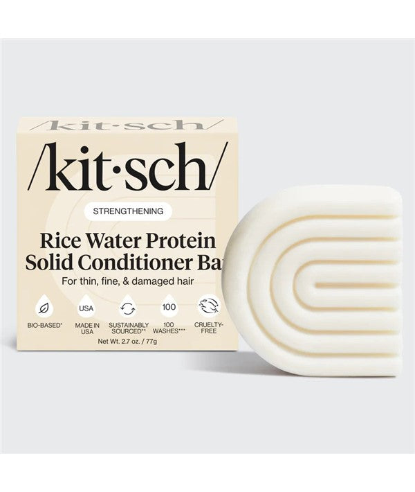 Kitsch rice water protein solid conditioner bar for strengthening hair, shown in a sleek, natural-colored bar shape.