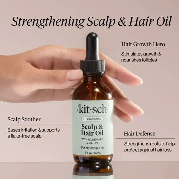 Kitsch strengthening scalp and hair oil bottle with dropper for nourishing hair treatment and scalp health.