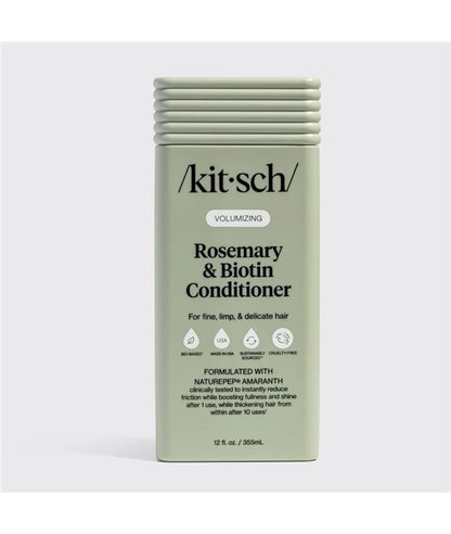Kitsch volumizing rosemary and biotin conditioner bottle with label, featuring green and white packaging for healthy hair.