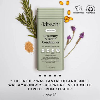 Kitsch volumizing rosemary and biotin conditioner bottle with herbal ingredients label on white background.
