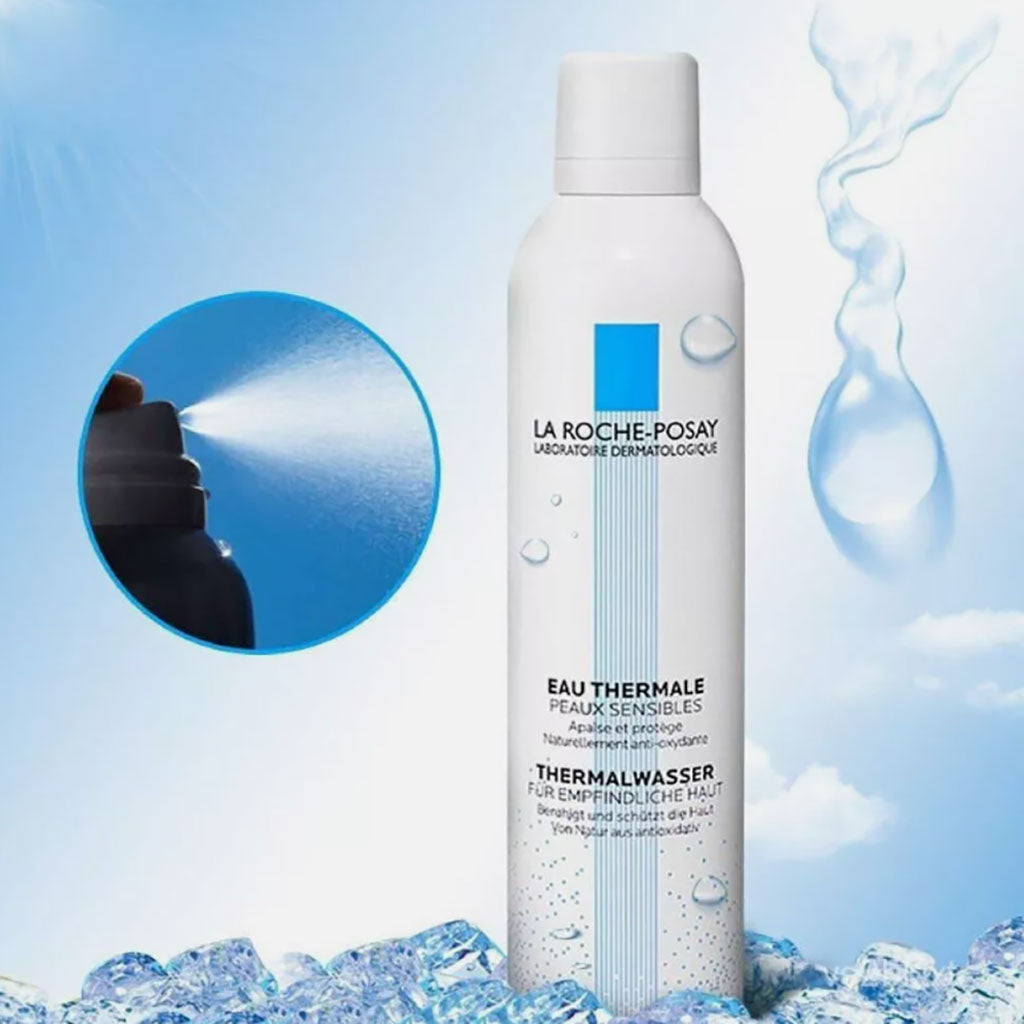 Bottle of La Roche Posay Thermal Spring Water, a skin care spray in a clear plastic container with a blue cap.