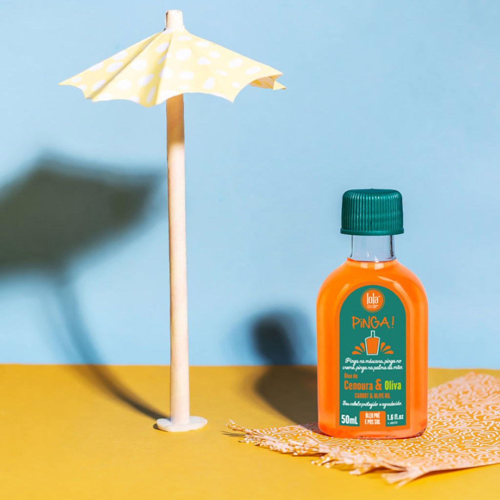 Lola Cosmetics Pinga Carrot and Olive Oil hair serum and oil bottle with vibrant label, designed for nourishing hair.
