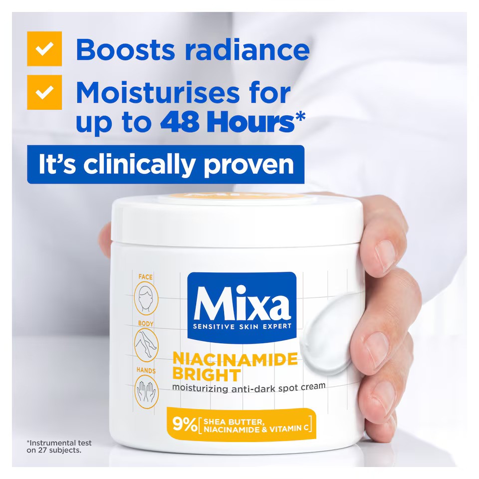 Mixa Niacinamide Bright Moisturising Anti Dark Spot Cream in 400ml jar, showing the skincare product with its label.