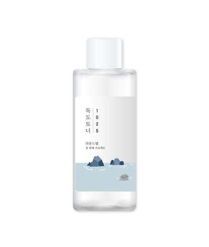 Round Lab 1025 Dokdo K-Beauty Toner in 100ml bottle, showcasing the clear liquid and minimalist label design.