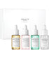 SKIN1004 Madagascar Centella Ampoule Kit featuring skincare ampoules and bottles in a natural setting, ideal for K-beauty routines.