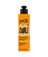 Schwarzkopf Got2b Curlz Moisturising Detangler conditioner bottle with curly hair in the background.
